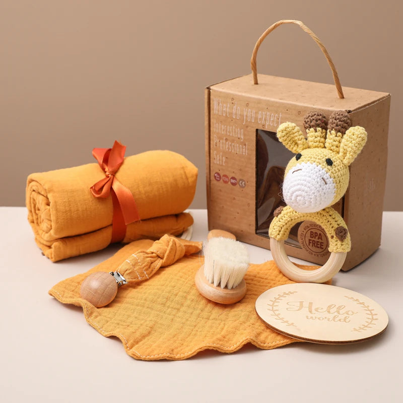Hagamos el juego de regalos para bebés: elementos esenciales reflexivos en una caja adorable