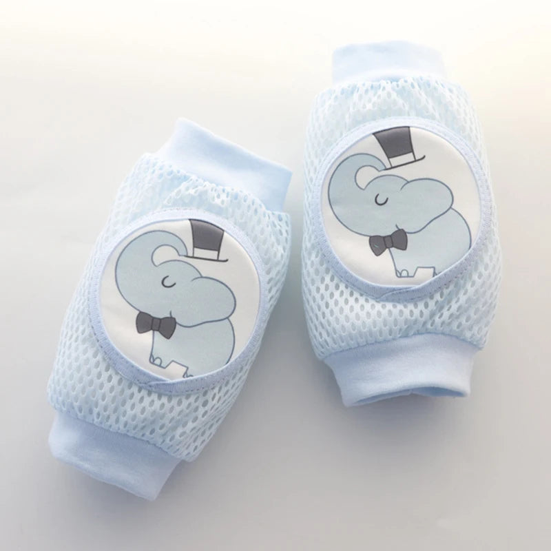 Niños que arrastran las rodillas y las almohadillas del codo