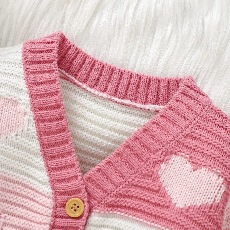 Cardigan a maglia a strisce rosa