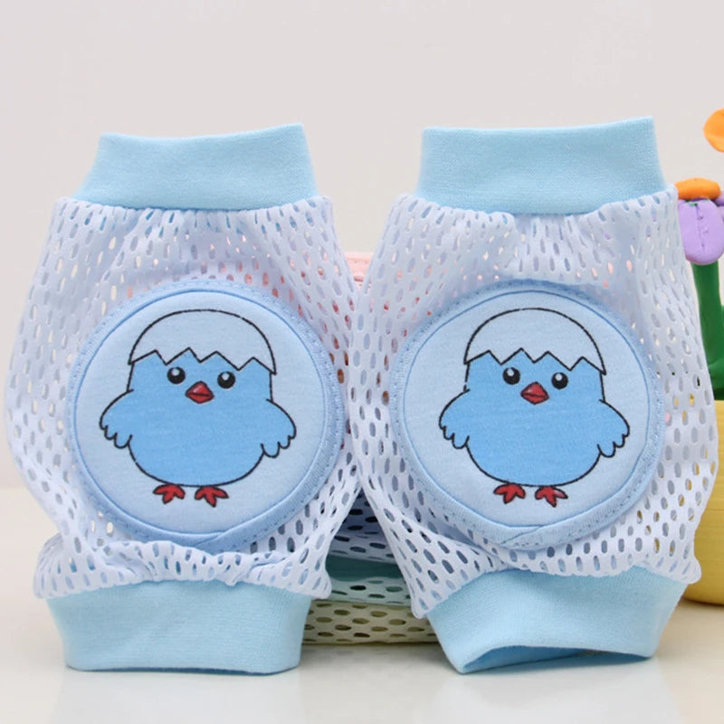 Niños que arrastran las rodillas y las almohadillas del codo