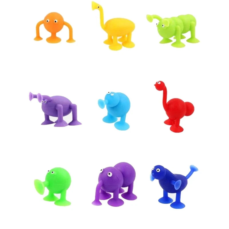 Coloridos juguetes de baño de taza de succión