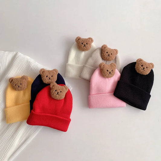 Cappelli a maglia con orsacchiotto accoglienti
