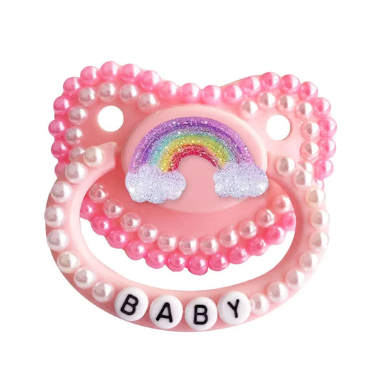 Set de chupete de brillo arcoiris y perla