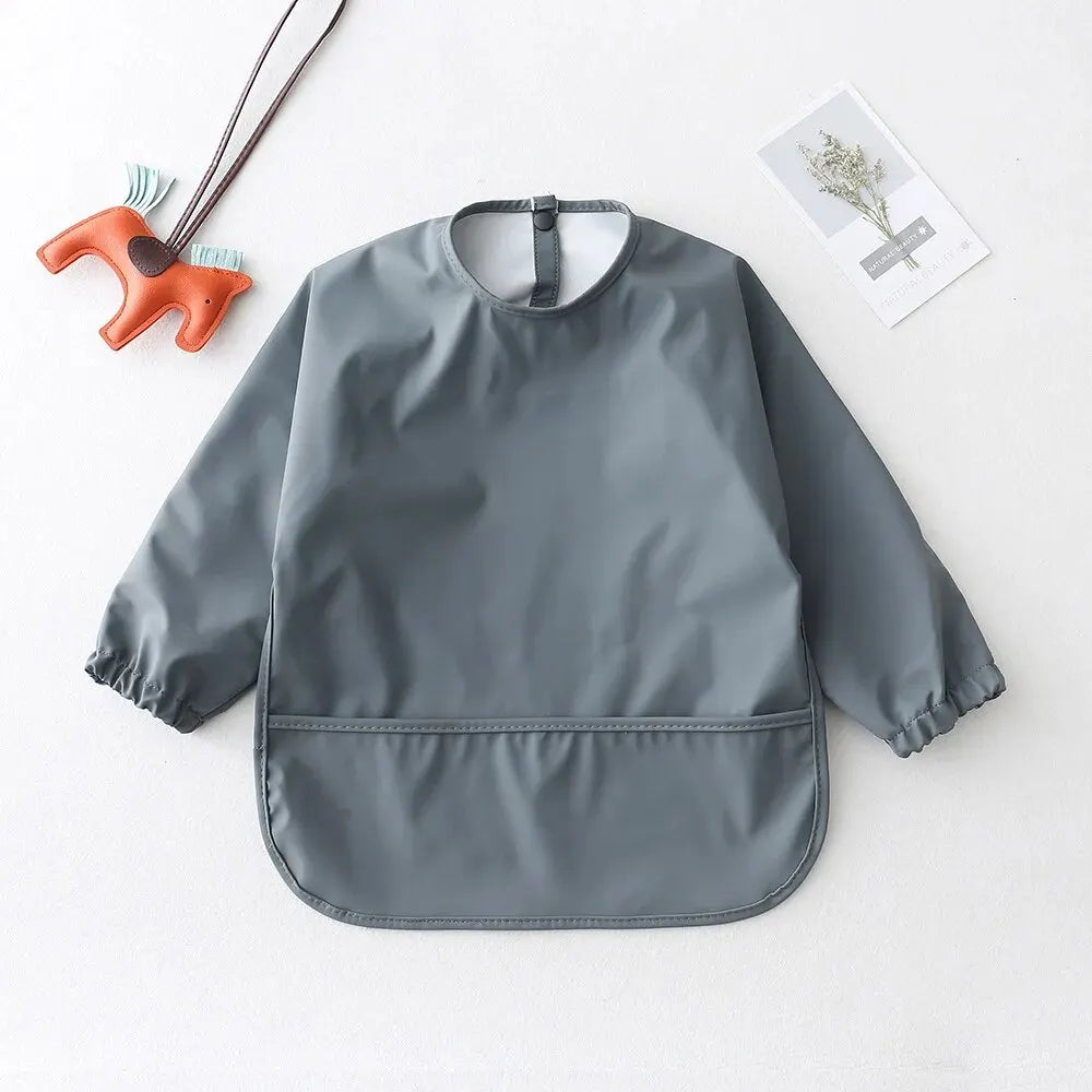 Camicia per bavaglini a maniche lunghe impermeabili 