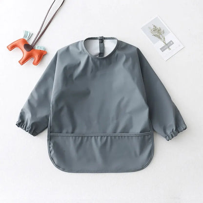 Camicia per bavaglini a maniche lunghe impermeabili 