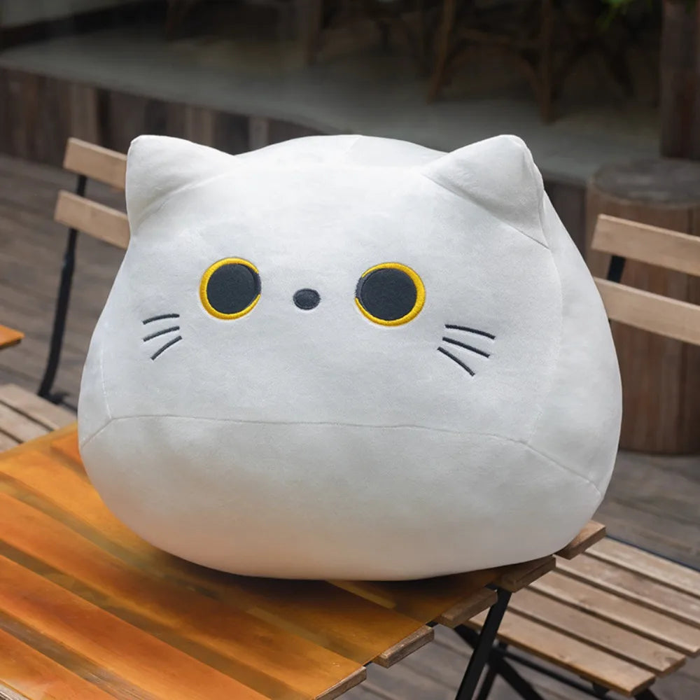 Cuscini di peluche con gatto rotondo