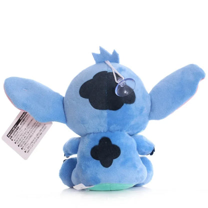 Muñeca de peluche de puntada