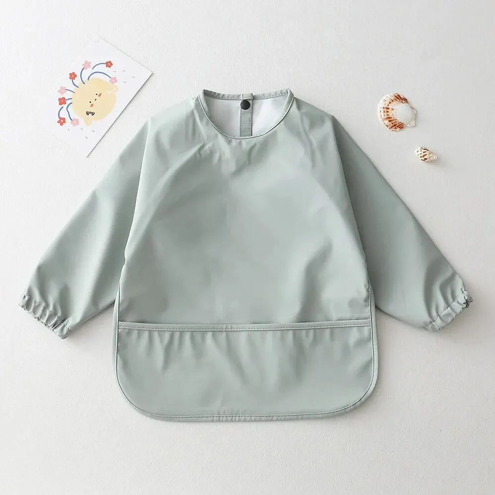 Camicia per bavaglini a maniche lunghe impermeabili 