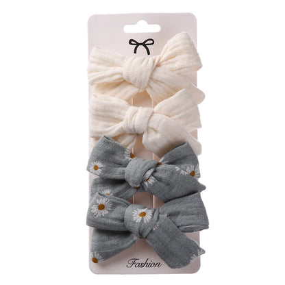 Set di clip per bambini floreali a 4 pezzi 