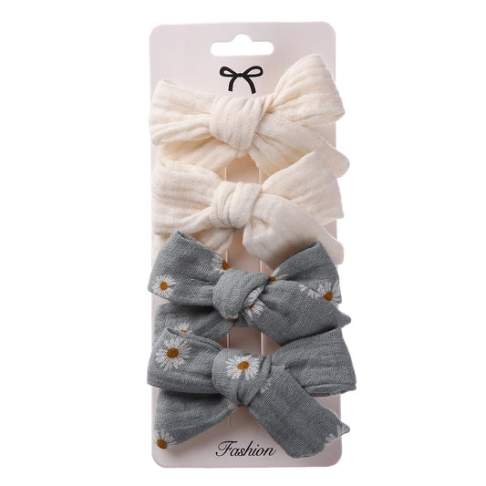 Set di clip per bambini floreali a 4 pezzi 