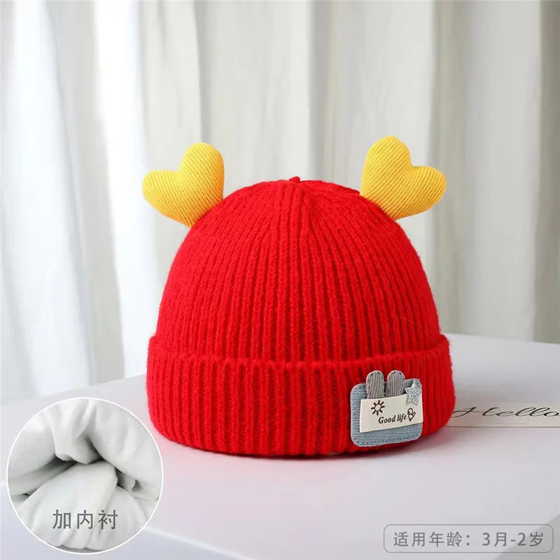 Cappello da bambino a maglia morbida con corna di peluche