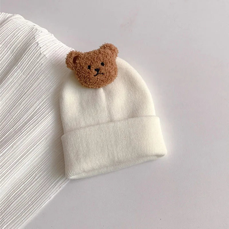 Cappelli a maglia con orsacchiotto accoglienti