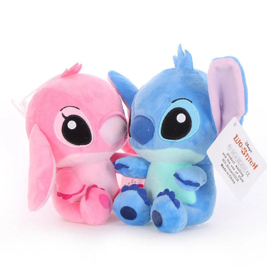 Muñeca de peluche de puntada