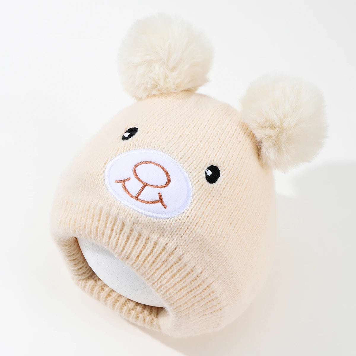 Cappello per bambini delle orecchie da orso sorridente