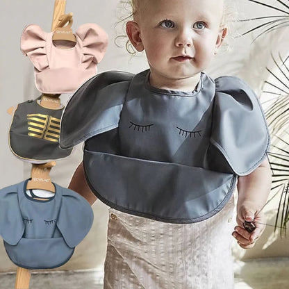 Eleganti bavaglini in silicone con maniche arruffate