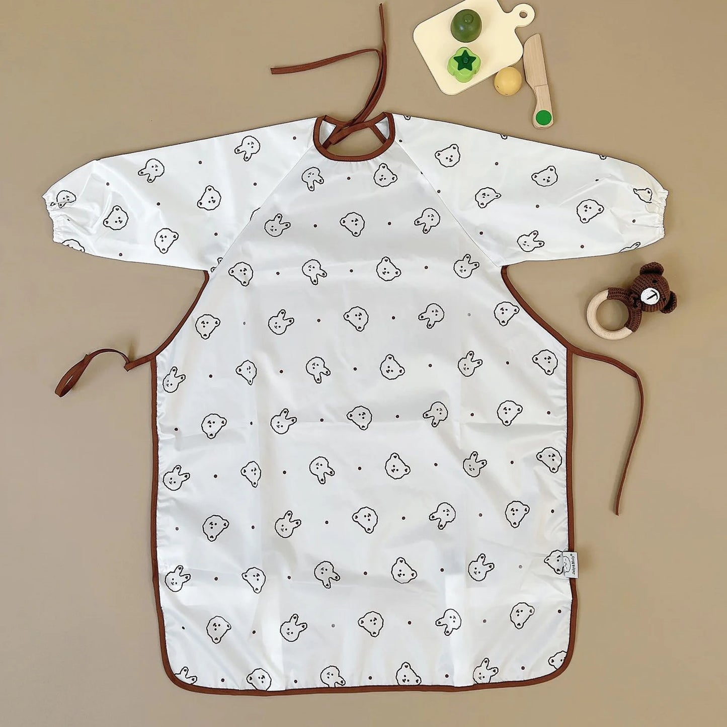 Bib con le maniche da nutrire per bambini a copertura piena 