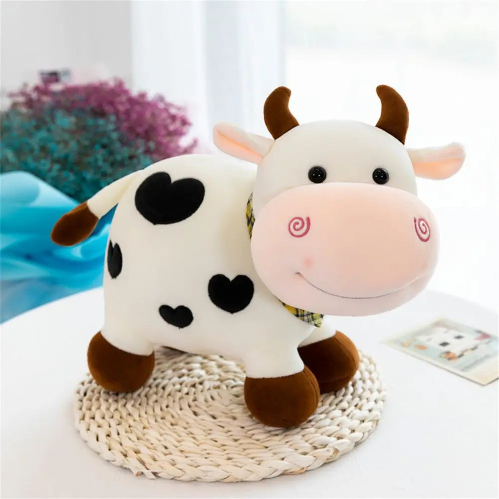 Giocattolo di peluche di mucca sorridente