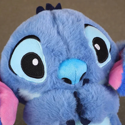Muñeca de peluche de puntada con música de iluminación