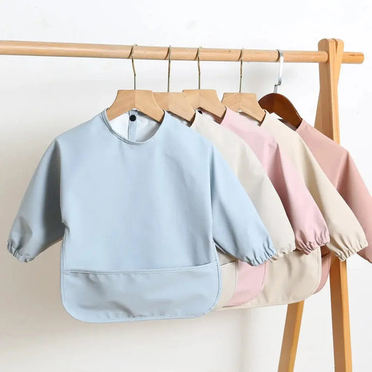 Camicia per bavaglini a maniche lunghe impermeabili 