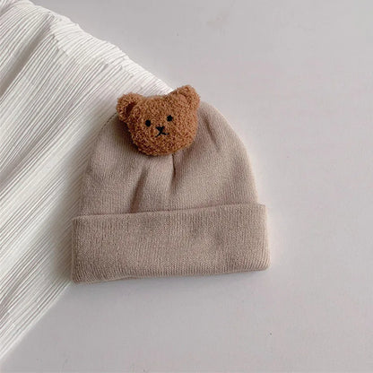 Cappelli a maglia con orsacchiotto accoglienti