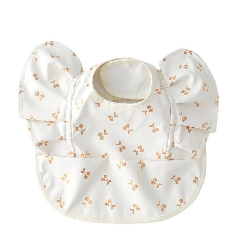 Eleganti bavaglini in silicone con maniche arruffate