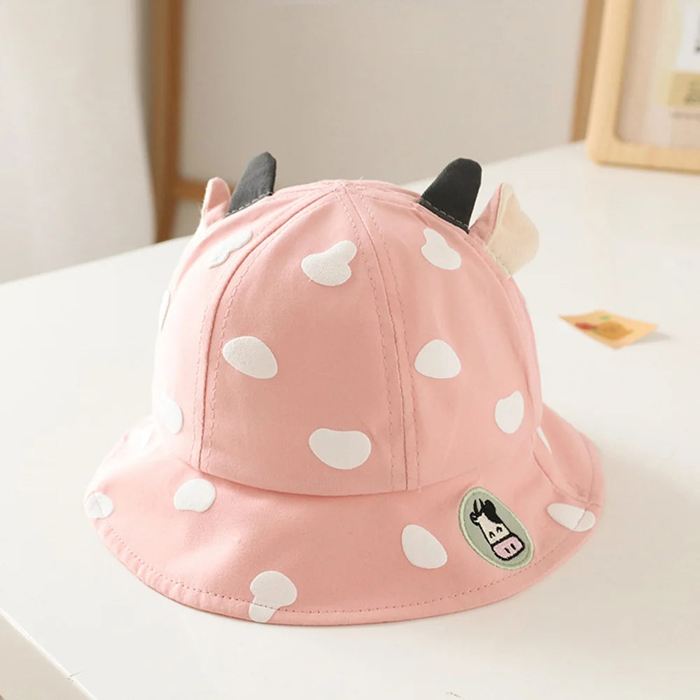 Sombrero de sol de bebé con estampado de vacas