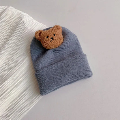 Cappelli a maglia con orsacchiotto accoglienti