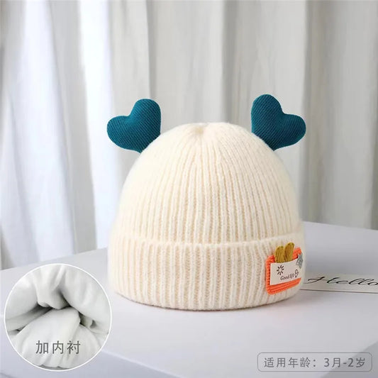 Cappello da bambino a maglia morbida con corna di peluche