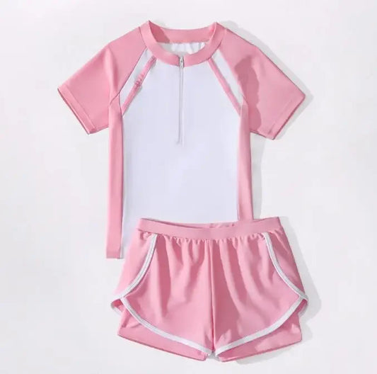 Juego de trajes de baño de chicas rosas y blancas