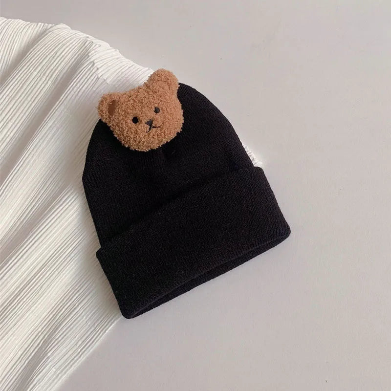 Cappelli a maglia con orsacchiotto accoglienti