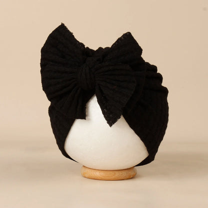 Sombrero de turbante para bebé anudado 