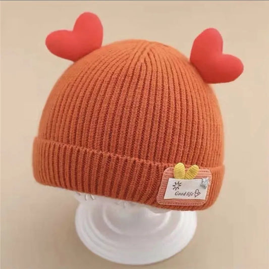 Cappello da bambino a maglia morbida con corna di peluche