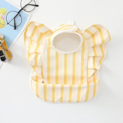 Eleganti bavaglini in silicone con maniche arruffate