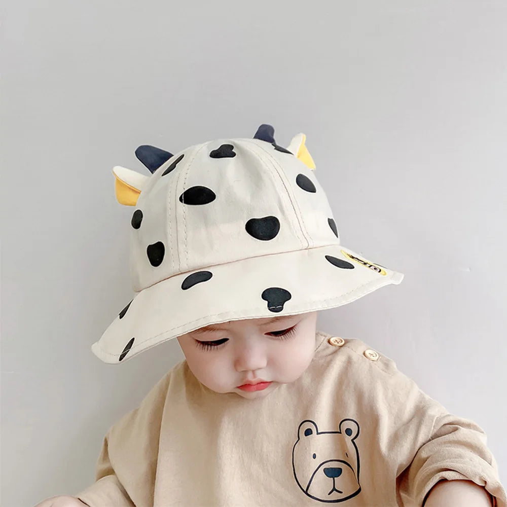 Sombrero de sol de bebé con estampado de vacas