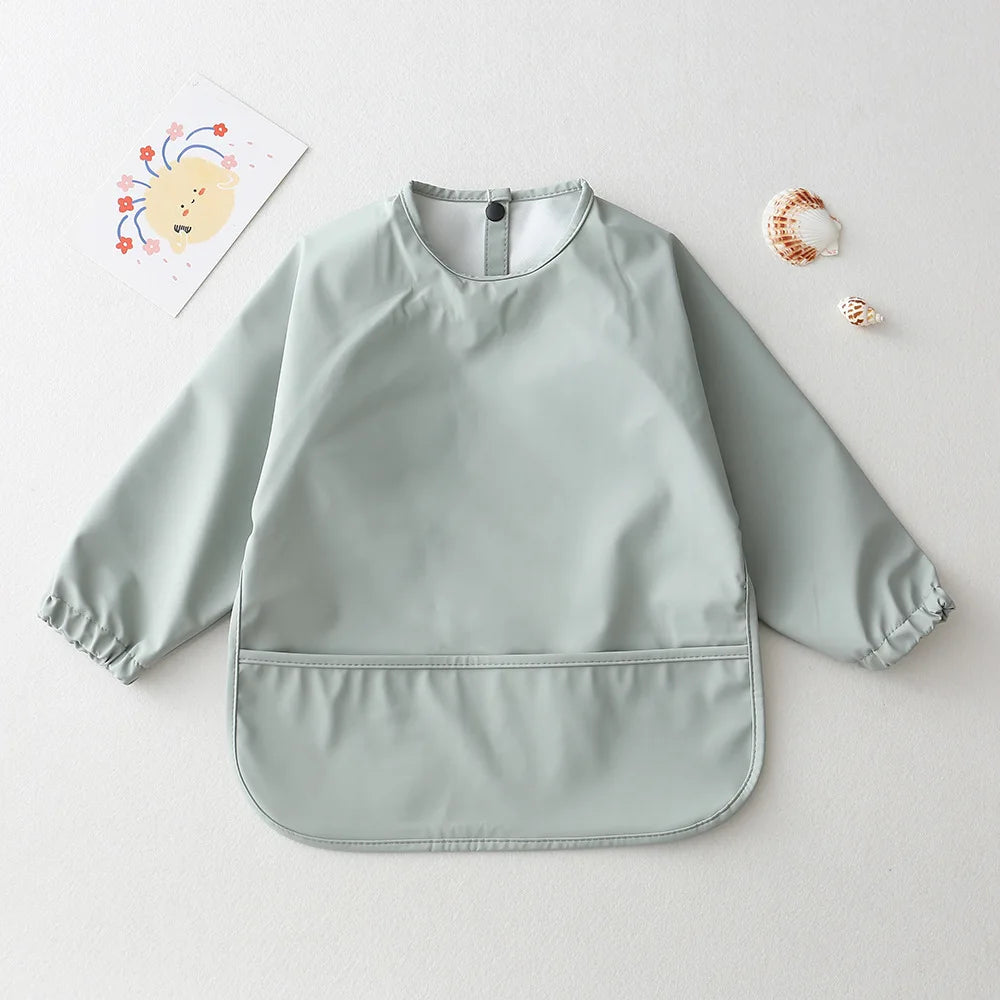Camicia per bavaglini a maniche lunghe impermeabili 
