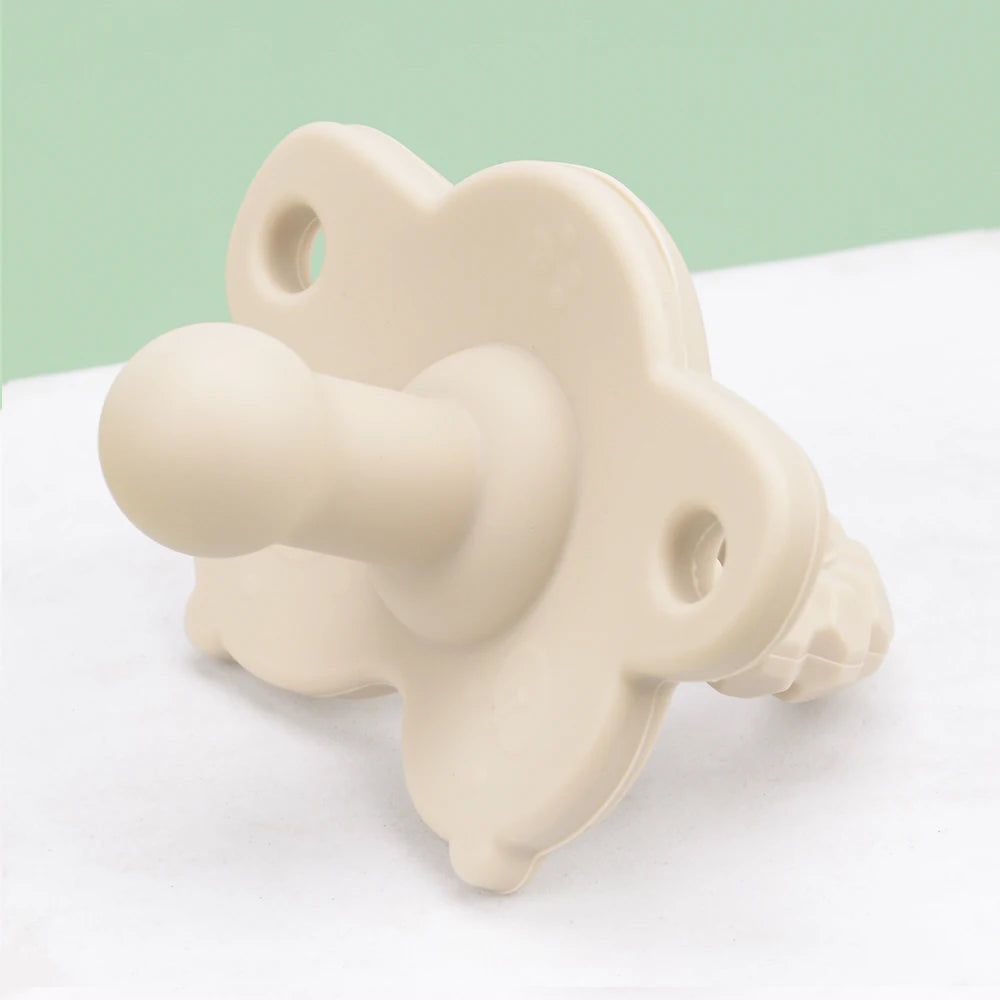 Chupete de bebé de silicona texturizado