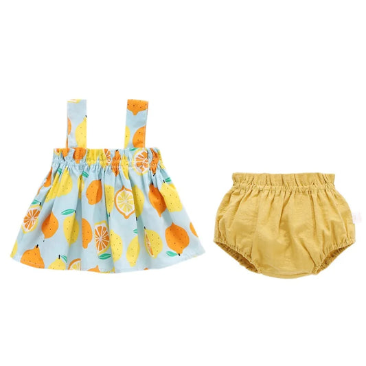 Set de fruta de verano y vestimenta floral 