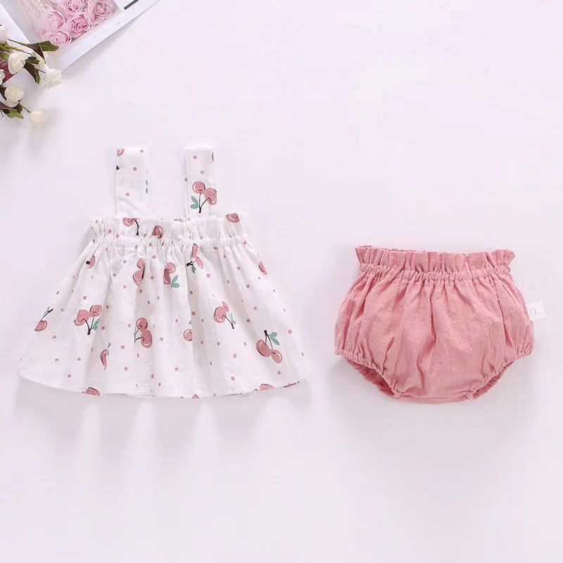 Set de fruta de verano y vestimenta floral 