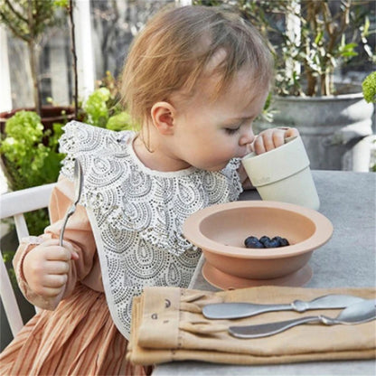 Eleganti bavaglini in silicone con maniche arruffate